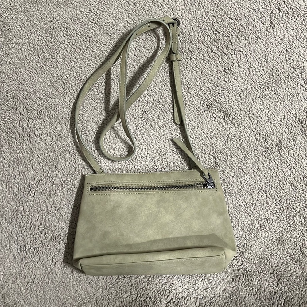 Light moss green crossbody bag.